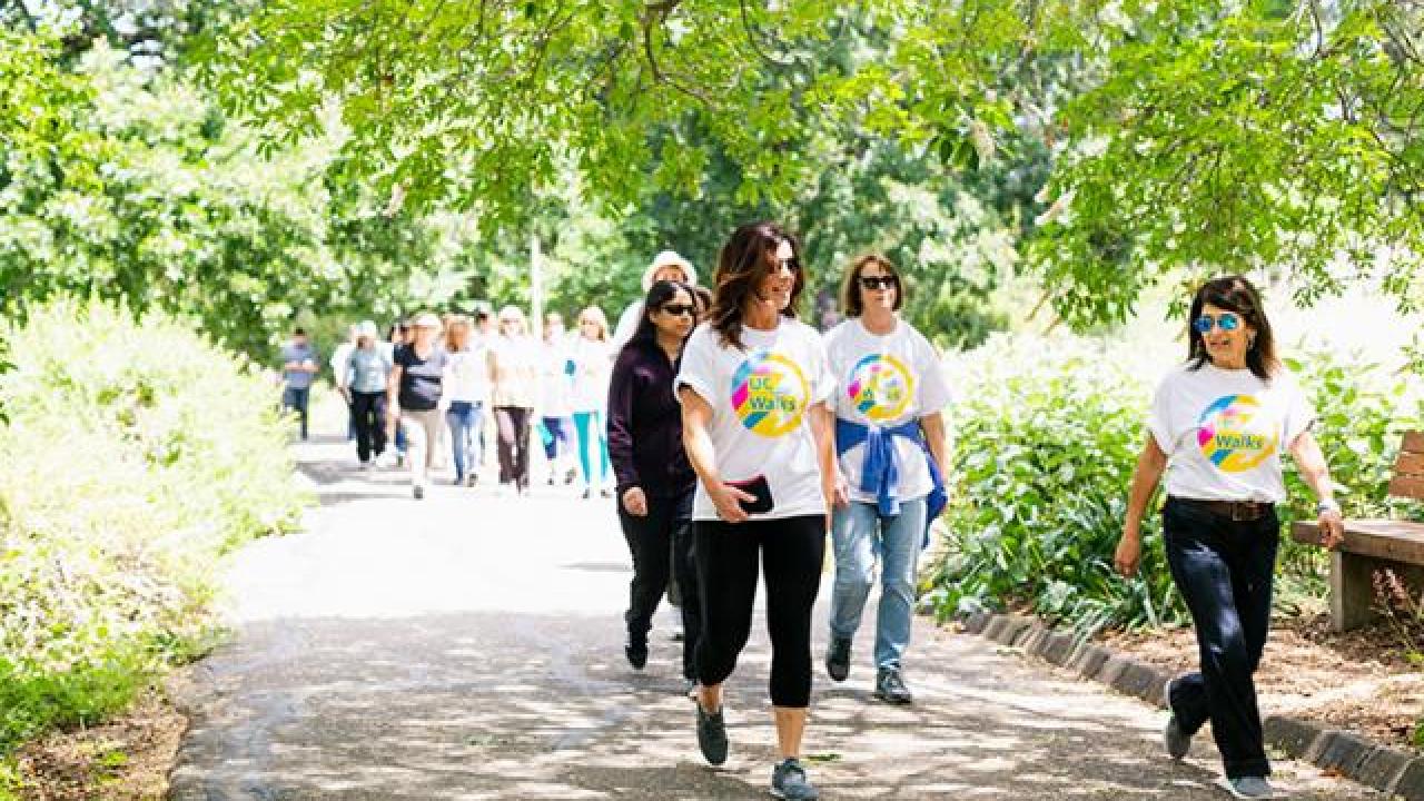 uc davis staff walking on path